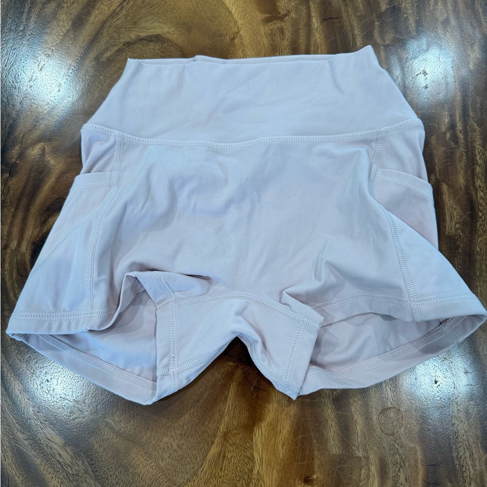 Violate the dress code pink spandex shorts